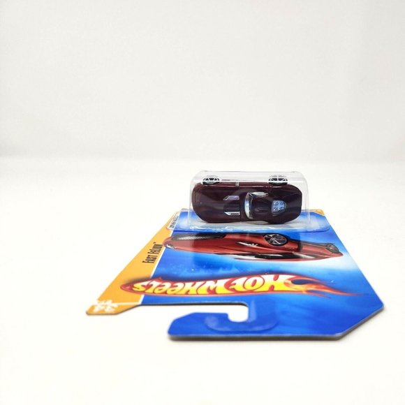 2009 Hot Wheels #34 New Models 34/42 FAST FELION 1:64 Burgundy (dd) - Picture 4 of 7